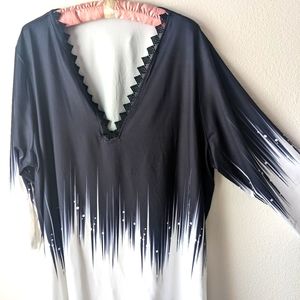 Brand new, black and white top. Size 2x.